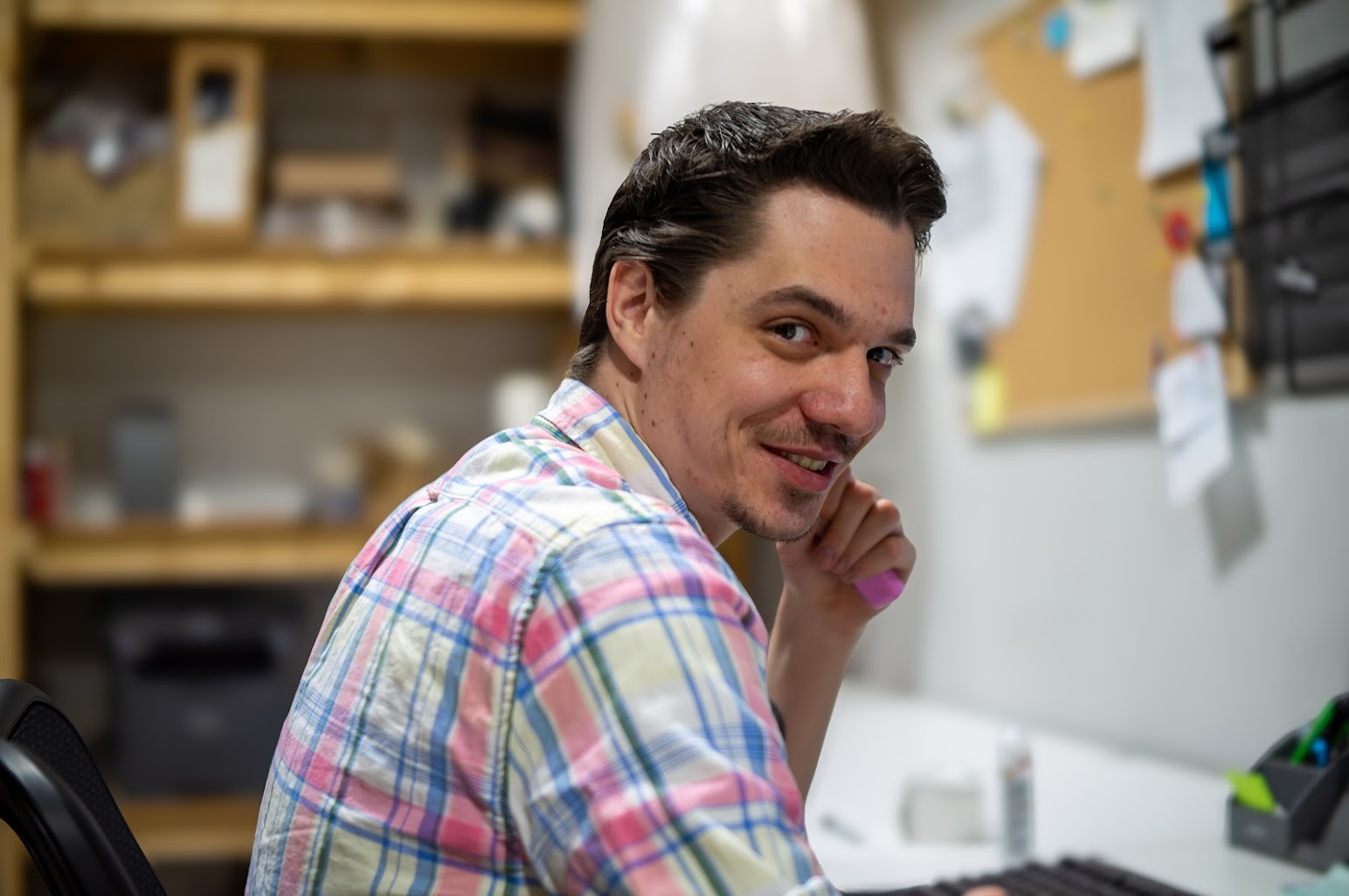 Zack at his desk